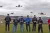 Pilots warming up before their drone race.